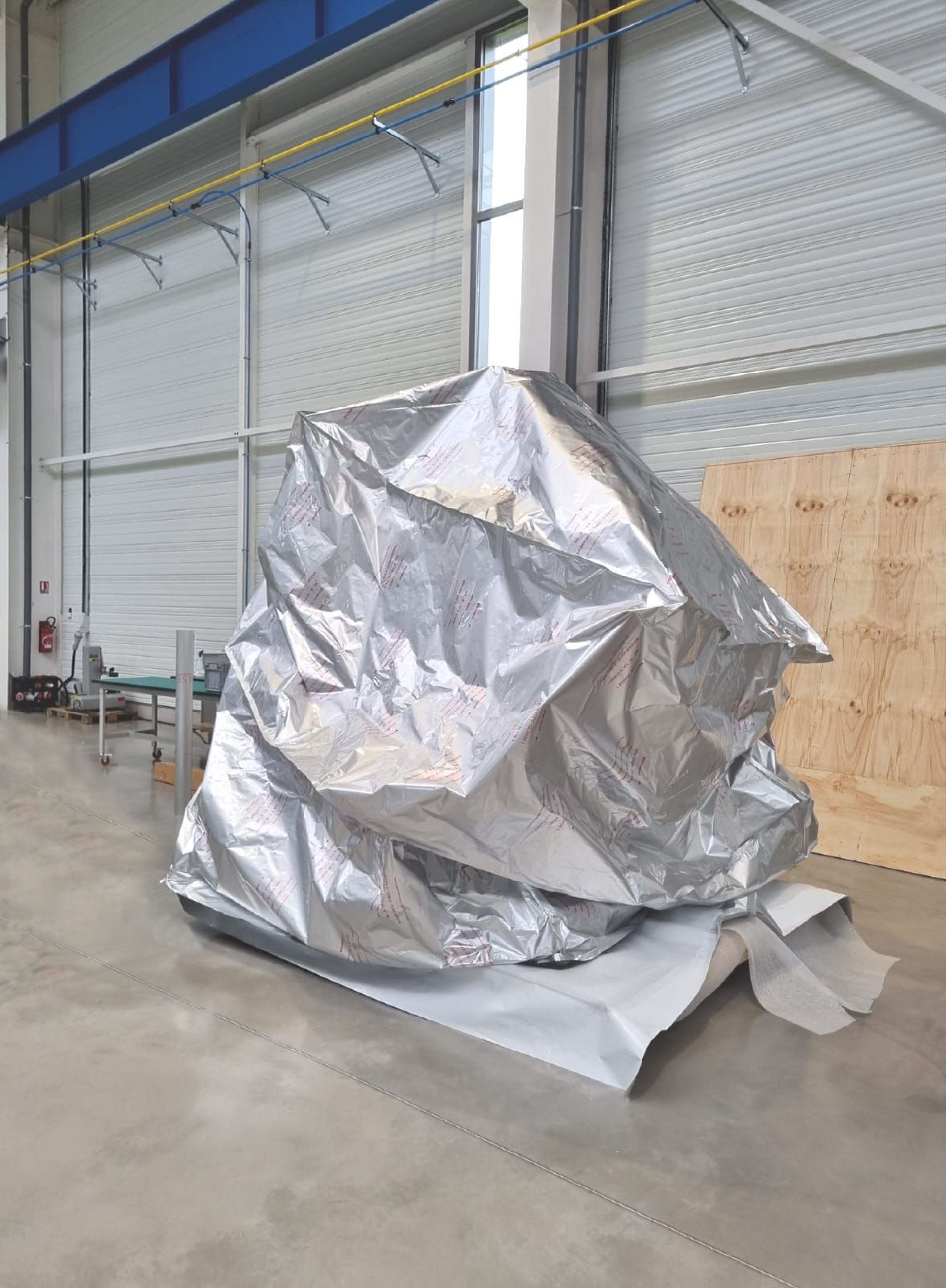 Emballage pour le transport maritime d'une machine-outil d'occasion
