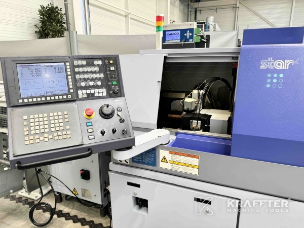 Tour CNC poupée mobile d'occasion STAR SR32 J Type N 90077 7 axes à vendre